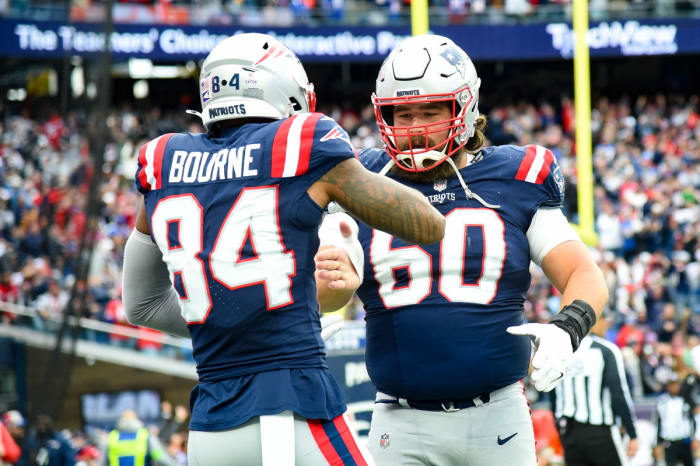 Oct 22, 2023; Foxborough, Massachusetts, USA; New England Patriots wide receiver Kendrick Bourne (84) and center David Andrews (60) celebrate after a touchdown during the second half against the Buffalo Bills at Gillette Stadium.